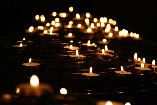 Tealight candles glowing in the dark