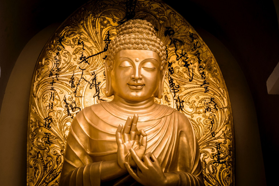 Buddha with the dharmachakra gesture