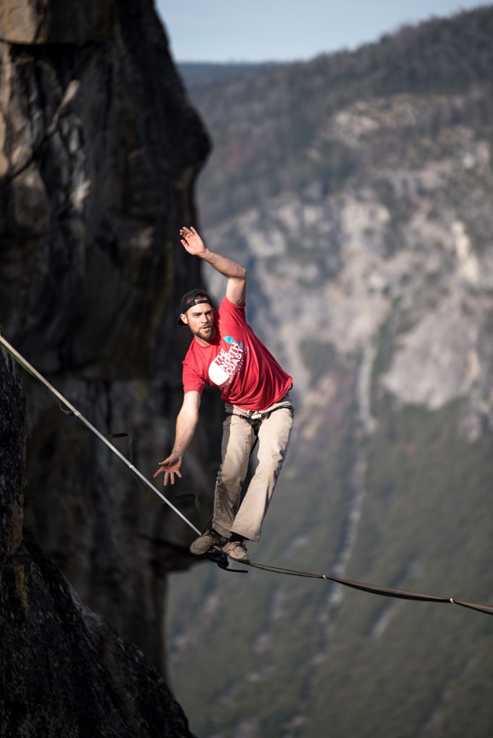 Man balancing on a tight rope