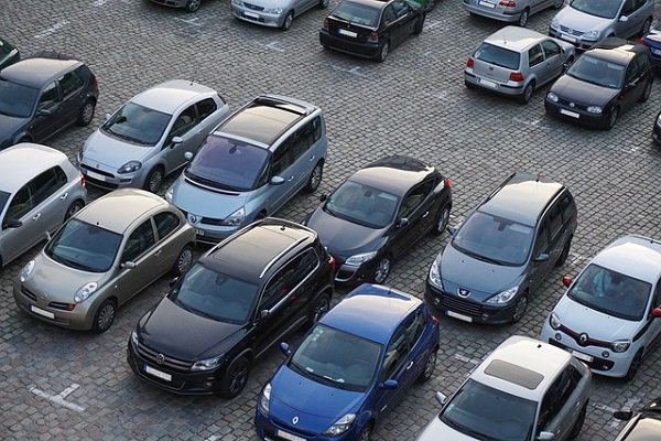 Cars parked in a paved lot