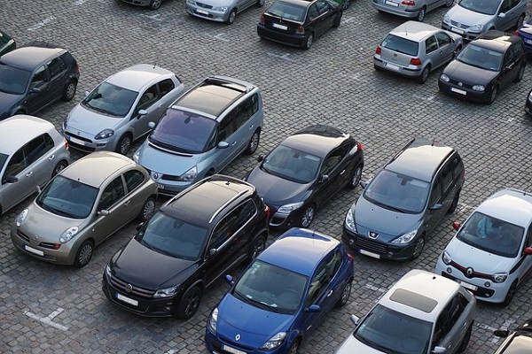 Cars parked in a paved lot