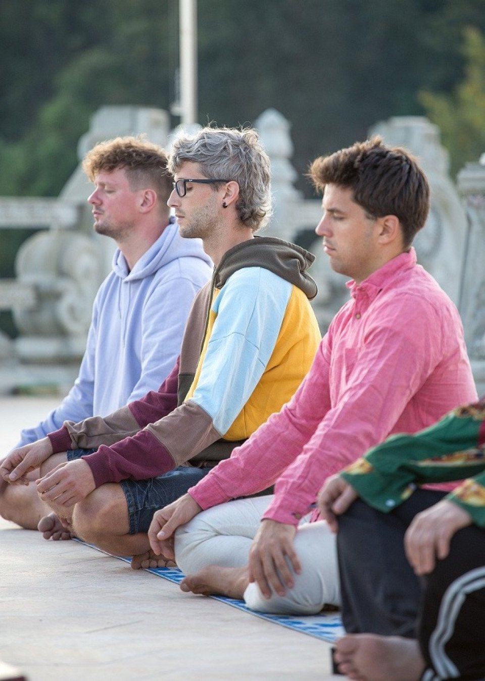 Men meditating