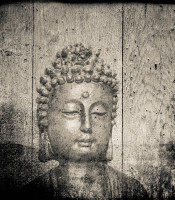 Etching of a Buddha on old wooden panels