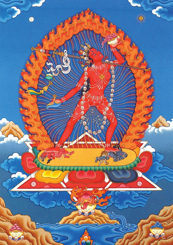 A traditional image of the dakini Vajrayogini in the sky surrounded by flames