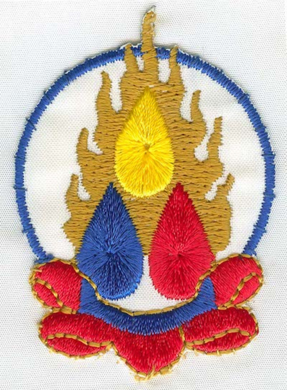 Buddha Dharma and Sangha jewels on a kesa